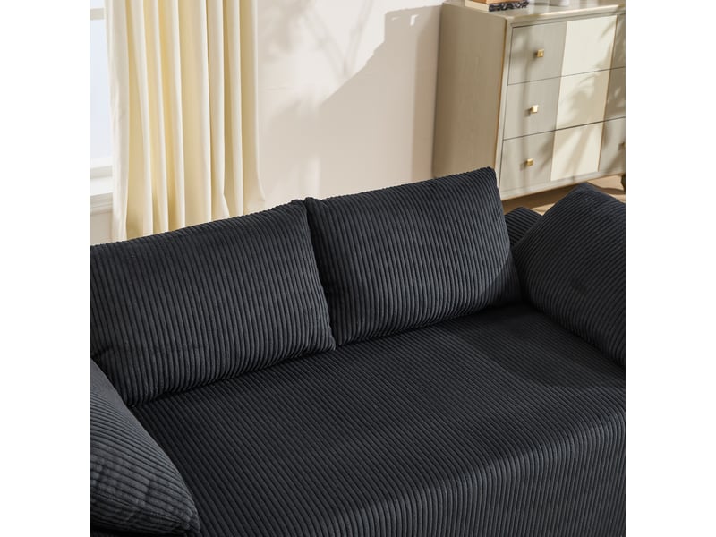 Canapé 2 places au sol en tissu noir avec accoudoirs incurvés et poches latérales - Conforama E
