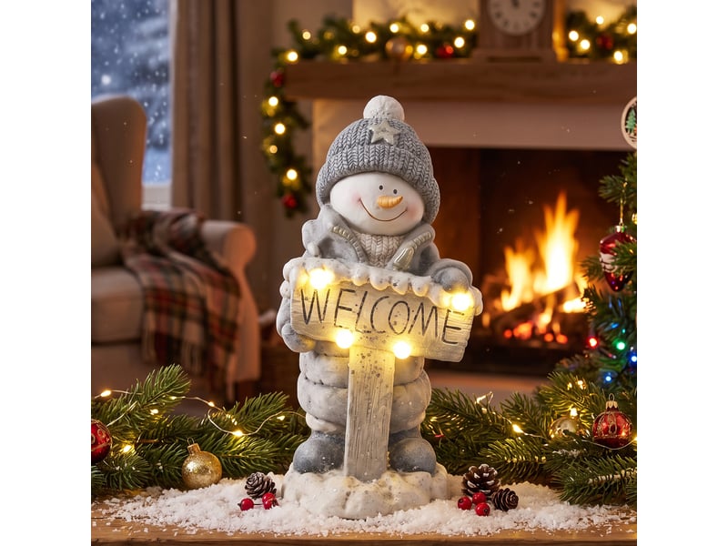  Décoration de noël : bonhomme de neige illuminé, statue de noël en mgo avec panneau de bienvenue, led et minuterie.  - Conforama C