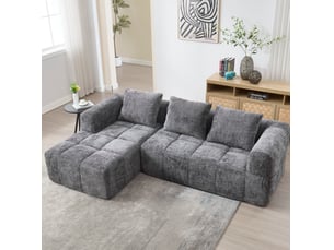 Canapé d'angle réversible 3 places en tissu gris avec méridienne, poches latérales et 3 coussins confortables