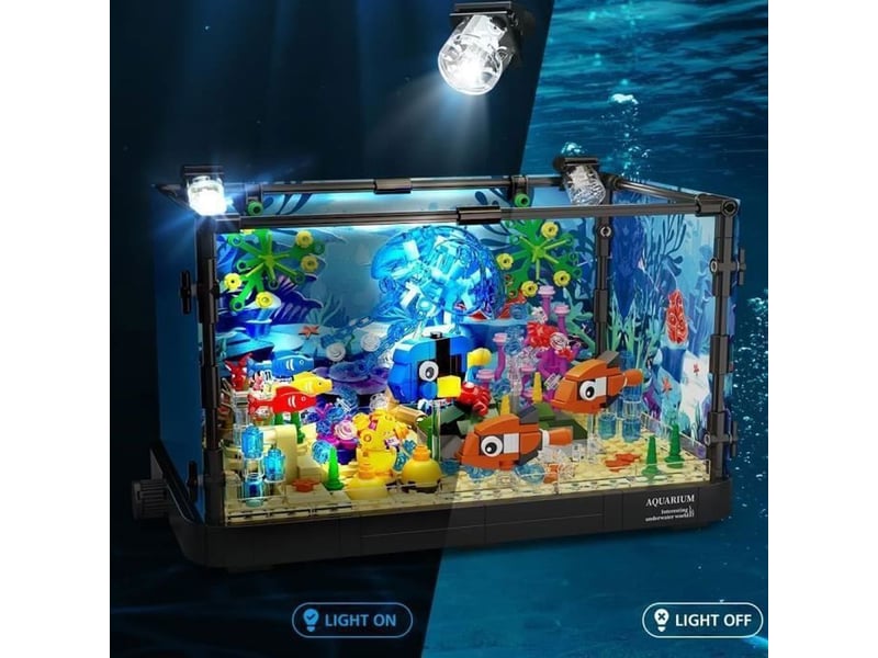  Set de construction aquarium 725 pieces avec 2 led, fond oceanique amovible et animaux marins mobiles  - Conforama B