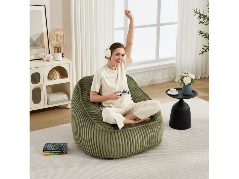  Fauteuil pouf à mousse à mémoire de forme, dossier enveloppant et assise large en velours côtelé vert émeraude  - Conforama C