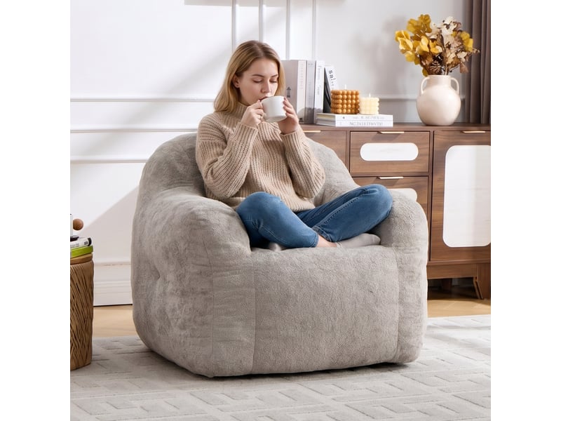  Pouf fauteuil gris clair en fausse fourrure avec accoudoirs, rembourré mousse  - Conforama B