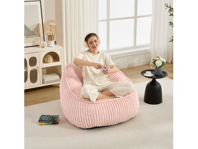  Fauteuil pouf à dossier haut garni de mousse à mémoire de forme, léger et enveloppant, en velours côtelé rose  - Conforama B