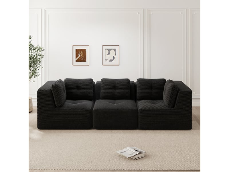 Canapé d'angle modulaire sans cadre avec assise profonde, dossier enveloppant et tissu côtelé noir - Conforama D