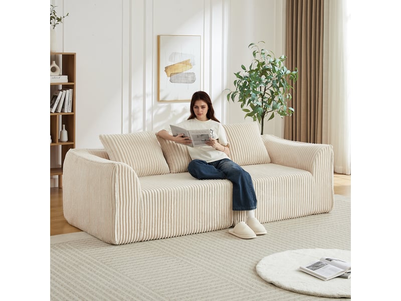  Canapé 235 cm en velours côtelé, dossier incliné et accoudoirs courbés, assise large, 2 coussins, ne nécessitant aucun montage  - Conforama B