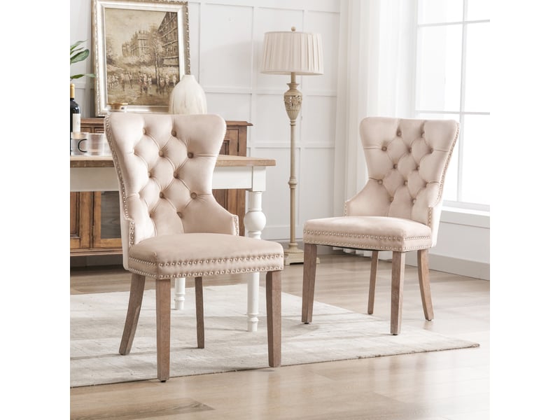  Lot de 2 chaises de salle à manger en velours beige – design capitonné avec anneau, clous décoratifs et pieds réglables effet usé  - Conforama C