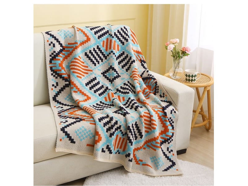  Plaid beige à motifs aztèques bleus et orange 130 x 180 cm nordik PD006-BEI-130 - Conforama A