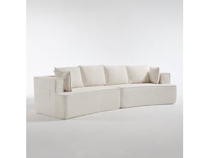 Canapé modulaire 4 places à assise profonde, silhouette incurvée et coussins en velours côtelé blanc
