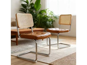 Lot de 2 chaises cantilever en cuir synthétique noir et cannage pieds en acier chromé style breuer