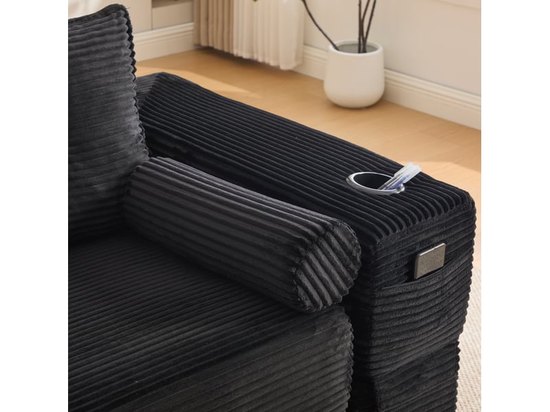  Canapé droit convertible 2 places en velours côtelé noir, avec poches latérales et porte-gobelet intégré  - Conforama D