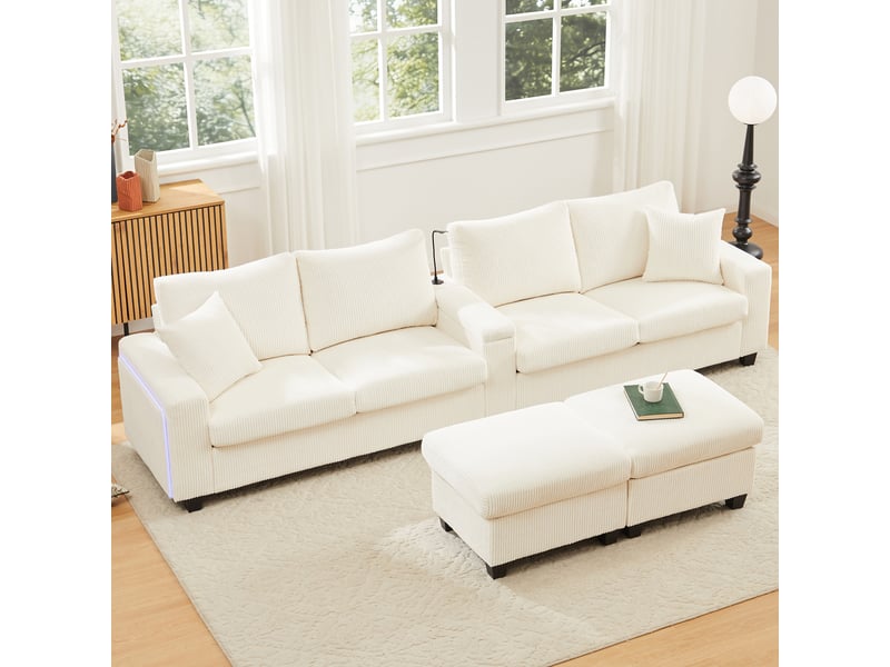 Canapé en u en velours côtelé beige 4 places, avec 2 poufs modulables, éclairage led, liseuse et ports usb pour grand salon moderne. - Conforama E