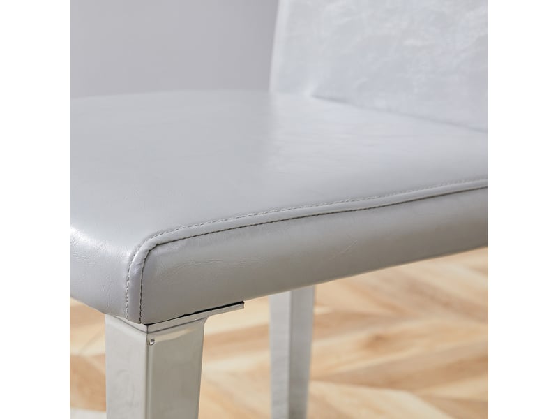  Chaises de salle à manger minimalistes lot de 2, style luxe léger européen gris argent, revêtement pu structuré gris clair et piètement métal argenté, idéales pour salle à manger ou salon  - Conforama D