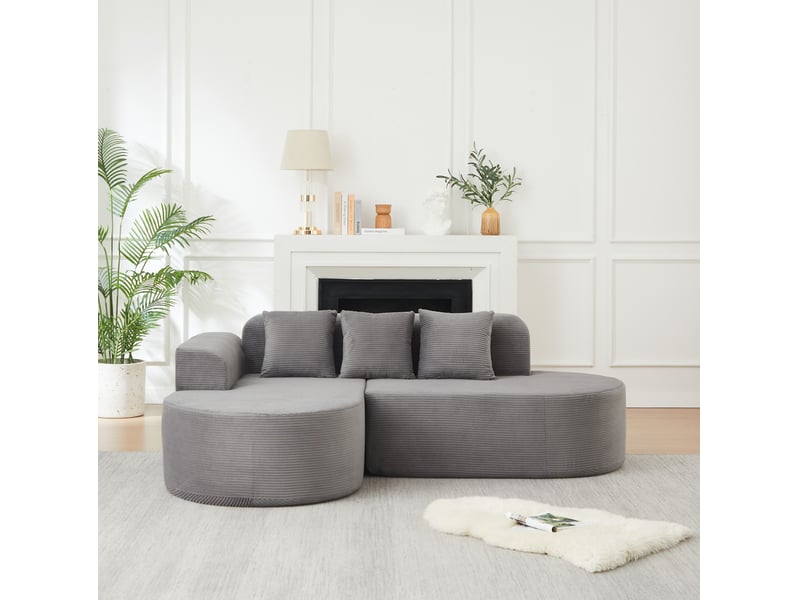 Canapé d'angle fixe 4 places avec méridienne incurvée et accoudoirs courbés, 3 coussins en velours côtelé gris - Conforama E