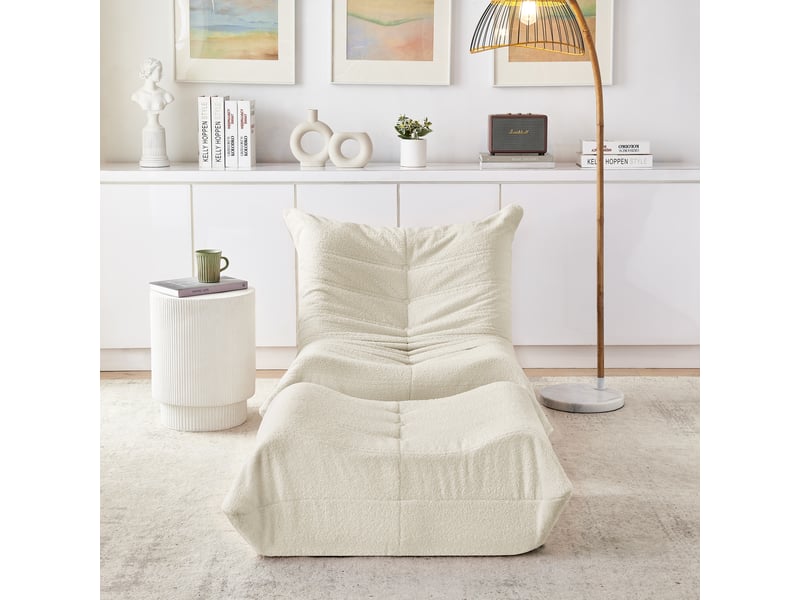  Fauteuil lounge bas beige en tissu bouclette teddy, dossier et repose-pieds  - Conforama B