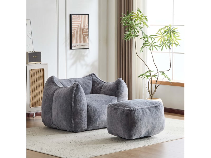  Fauteuil avec pouf assorti, assise en mousse et forme arrondie pour salon, en fausse fourrure grise  - Conforama B