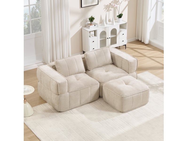  Canapé d'angle modulaire 2 places avec pouf, assise profonde et base antidérapante en polyester beige  - Conforama D
