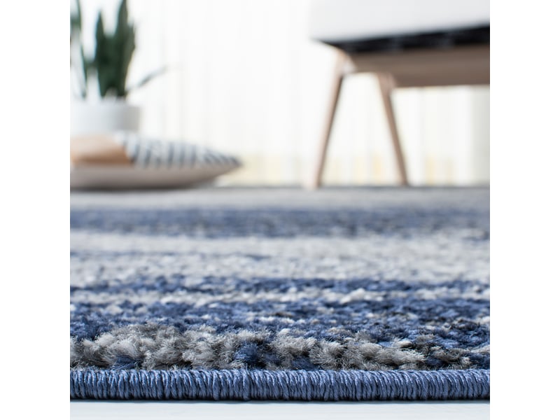  Tapis abstrait moderne en polypropylène grisbleu, 76 x 122 cm  - Conforama D