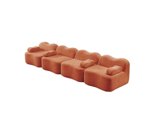 Canapé modulaire 4 places en velours orange, forme ondulée, assise profonde et confort pour votre salon