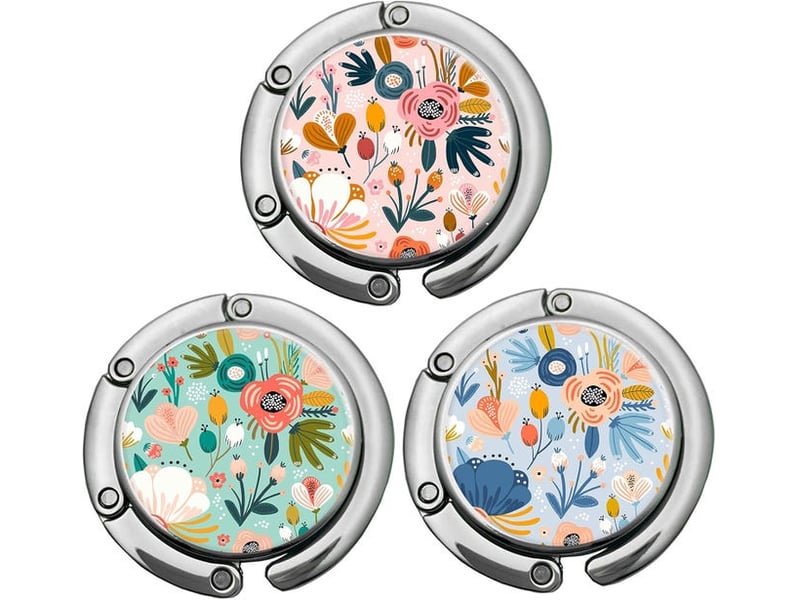  Un ensemble de 3 crochets pliables pour nappes - compacts et légers - à motif floral - adaptés aux tables d'une épaisseur maximale de 5 cm, multicolore HRC0004024LY - Conforama B