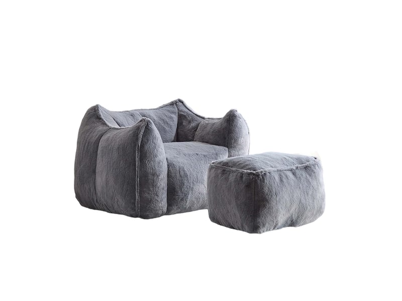 Fauteuil avec pouf assorti, assise en mousse et forme arrondie pour salon, en fausse fourrure grise - Conforama A