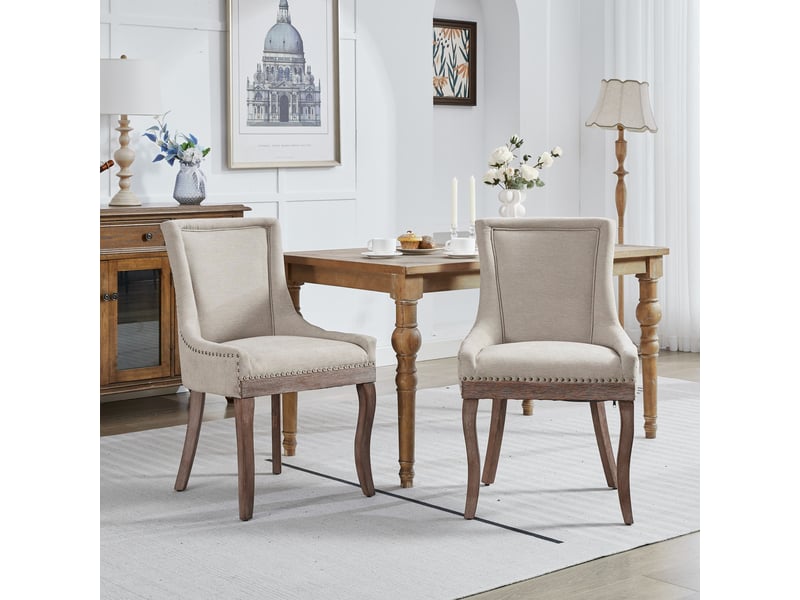  Lot de 2 chaises de salle à manger en tissu épais beige pieds en bois massif clous bronze  - Conforama D
