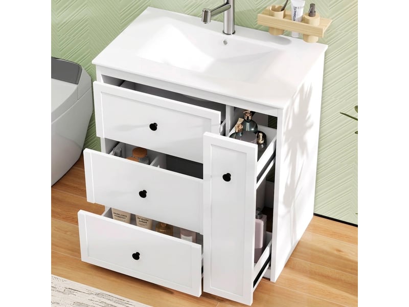  Meuble salle de bain sur pied 76 cm avec lavabo en céramique intégré et 4 tiroirs blanc  - Conforama D
