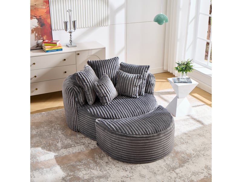  Fauteuil avec repose-pieds rond, dossier et accoudoirs de soutien, cinq coussins, en velours côtelé gris foncé  - Conforama D