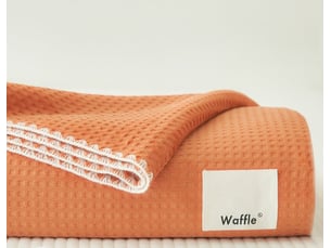 Plaid orange gaufré surpiqûres blanche 150 x 200 cm waffle