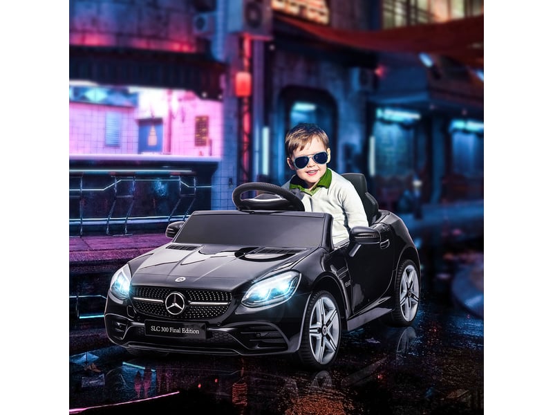  Voiture électrique pour enfants, avec phares led, ceinture de sécurité, klaxon, musique, 3-5 kmh, noire, 107 x 62,5 x 44 cm  - Conforama D