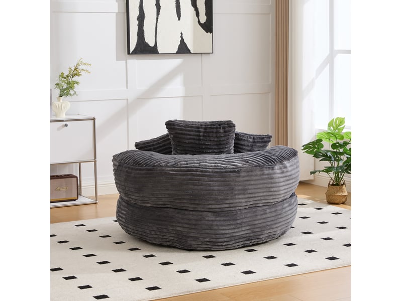  Fauteuil pouf 1 place en velours côtelé gris foncé avec 3 coussins, dossier haut et accoudoirs enveloppants  - Conforama E