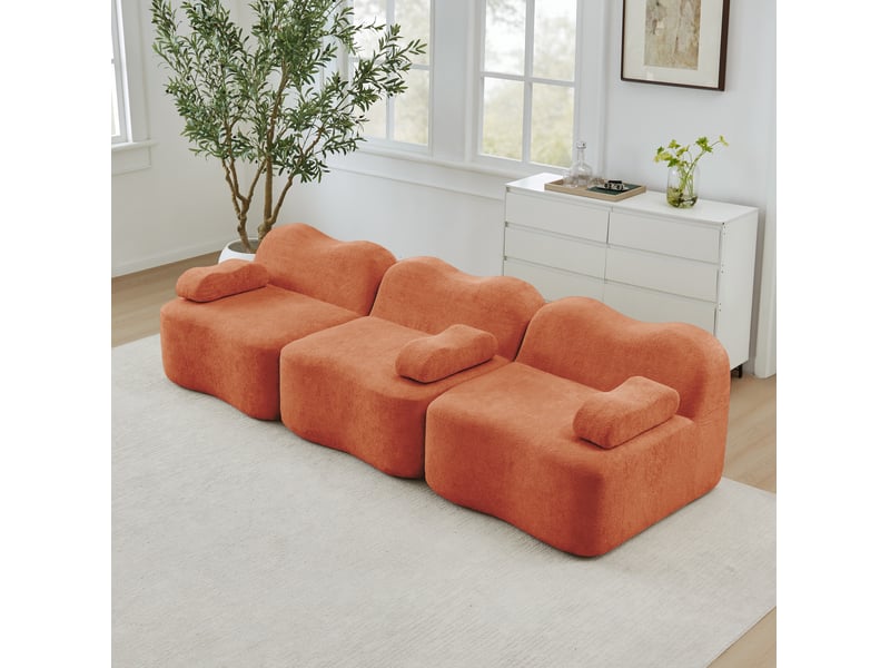  Canapé modulaire 3 places en velours orange, forme ondulée et assise profonde pour un salon accueillant  - Conforama B
