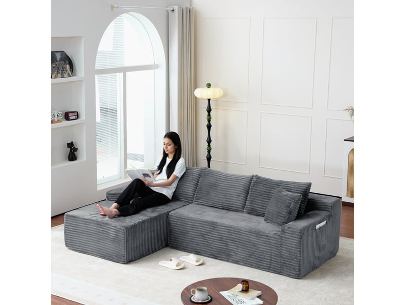  Canapé d’angle modulable gauche compressé 4 places en mousse et velours côtelé couleur gris, style moderne  - Conforama E