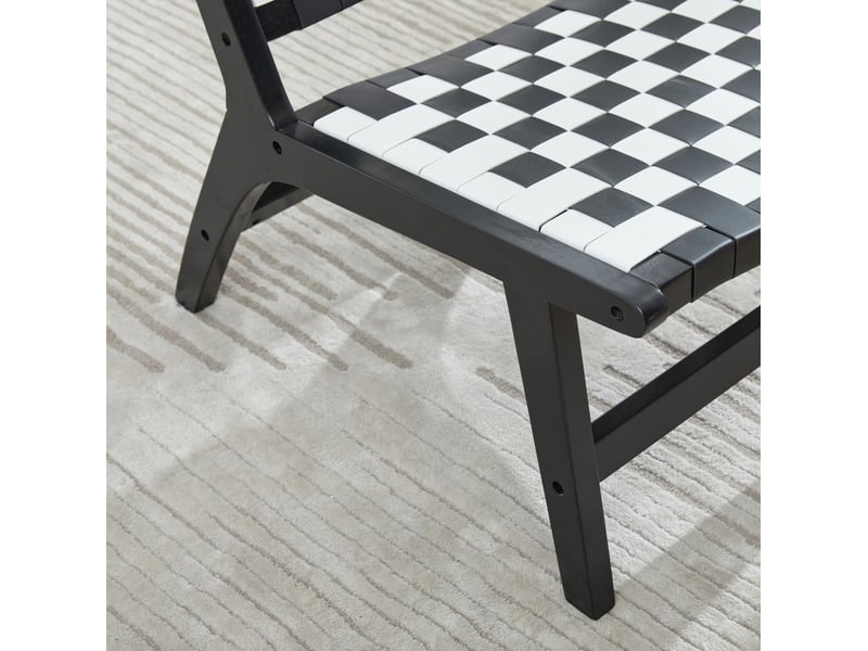 Fauteuil sans accoudoirs tressé à motif damier, assise basse compacte pour salon, en bois et pu noir  - Conforama E